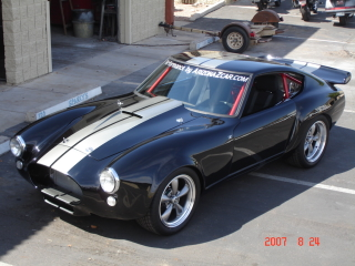 Illustration for article titled Datsun 260Z With The Face Of A Snake And The Tail Of A Stallion